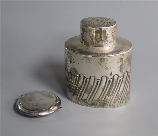 A late Victorian silver tea caddy, Sheffield, 1897 and a compact.